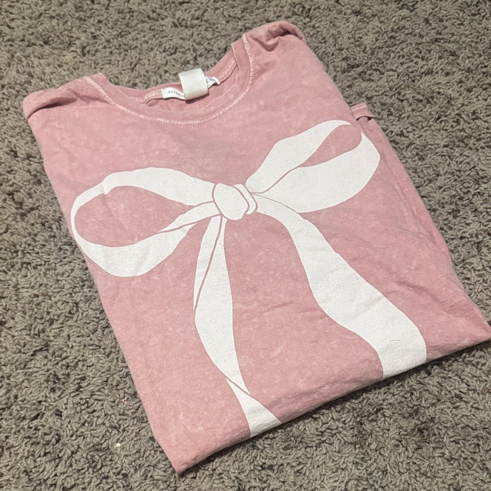 Pink T-Shirt with White Bow Design